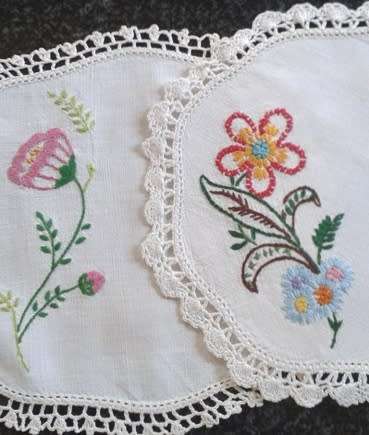 Two lovely vintage embroidered linen doilies 20cm square