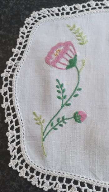 Two lovely vintage embroidered linen doilies 20cm square
