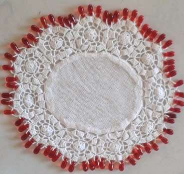 Red glass teardrop beaded doilie net centre