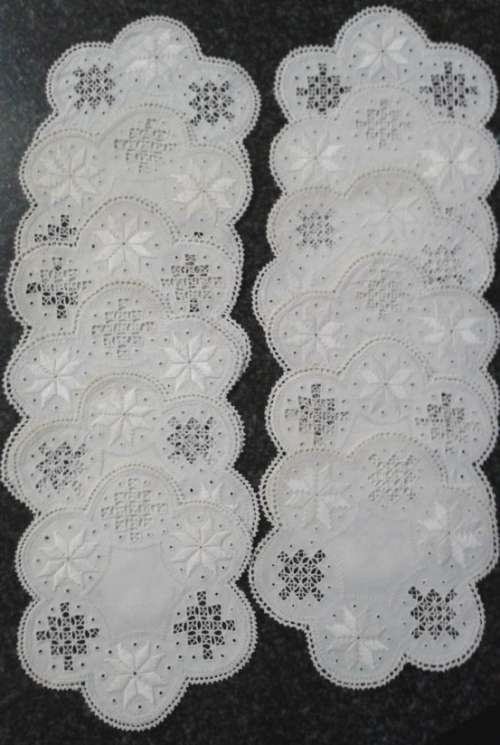 Two dozen round vintage linen Lefkara lace doilies/table mats