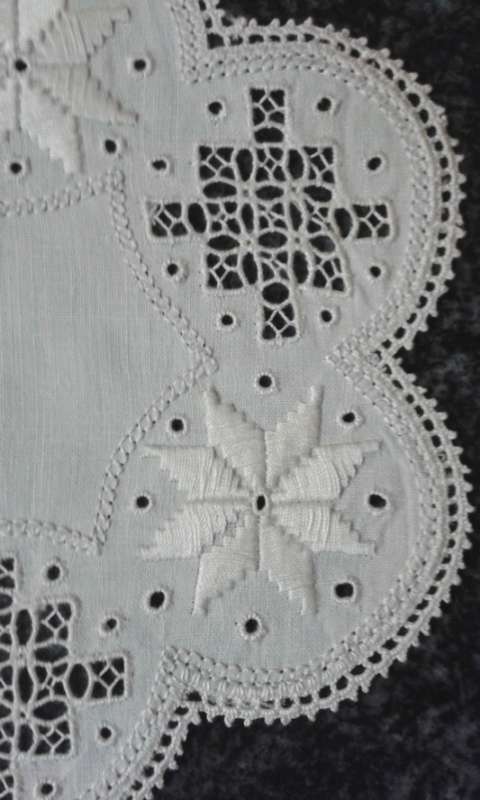 Two dozen round vintage linen Lefkara lace doilies/table mats
