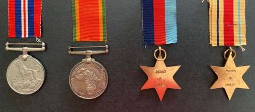 WW2 : L/CPL G MILLER (SET OF 4 ) NO 243223 WITH AN 8 CLASP