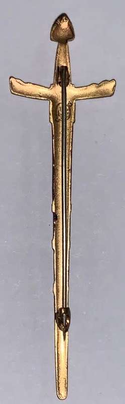 A Miniature Sword pendant.