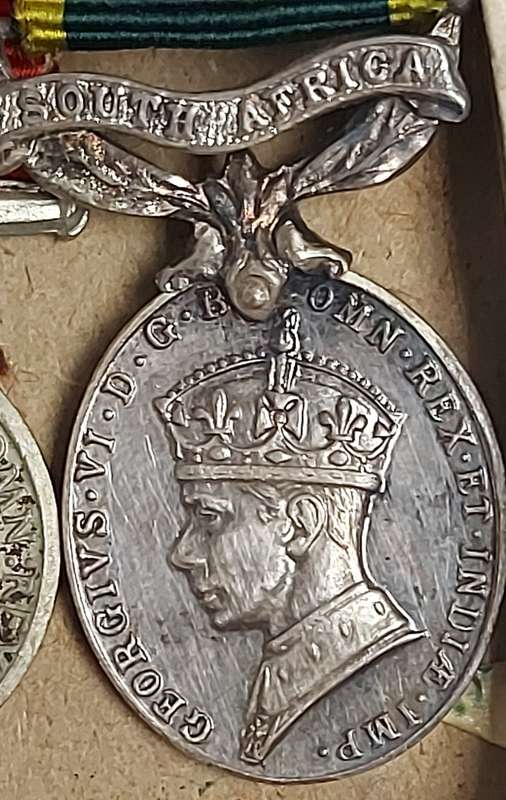A SET OF MINIATURE WW2 MEDALS FOR CAPTAIN LC CROSS