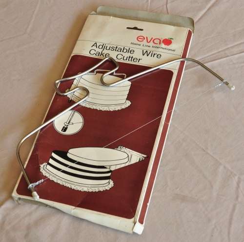 Eva Home Line International Adjustable Wire Cake Cutter in original packaging