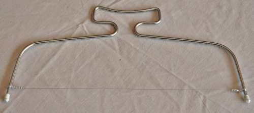 Eva Home Line International Adjustable Wire Cake Cutter in original packaging
