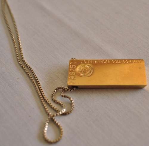 The Gold Bullion Collection 22 carat gold plated bar pendant and chain designed by Royston Lamond