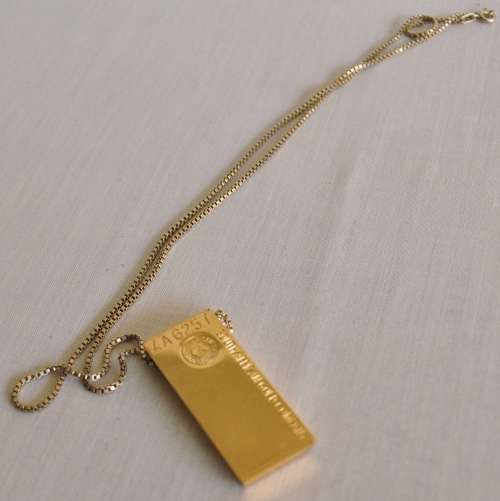 The Gold Bullion Collection 22 carat gold plated bar pendant and chain designed by Royston Lamond