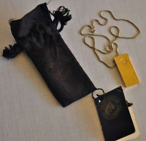 The Gold Bullion Collection 22 carat gold plated bar pendant and chain designed by Royston Lamond