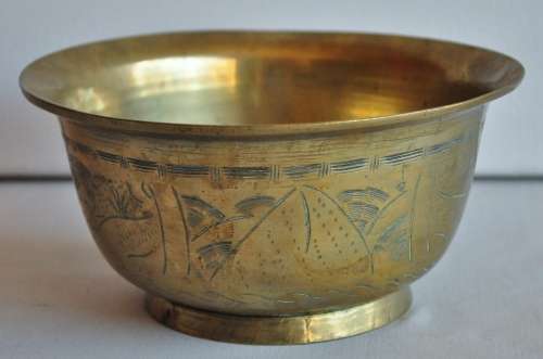 Vintage engraved solid brass bowl marked 'China' on the base