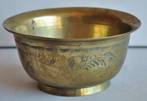 Vintage engraved solid brass bowl marked 'China' on the base