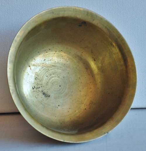 Vintage engraved solid brass bowl marked 'China' on the base