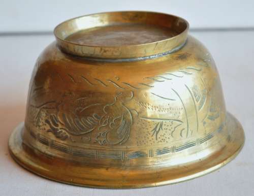Vintage engraved solid brass bowl marked 'China' on the base
