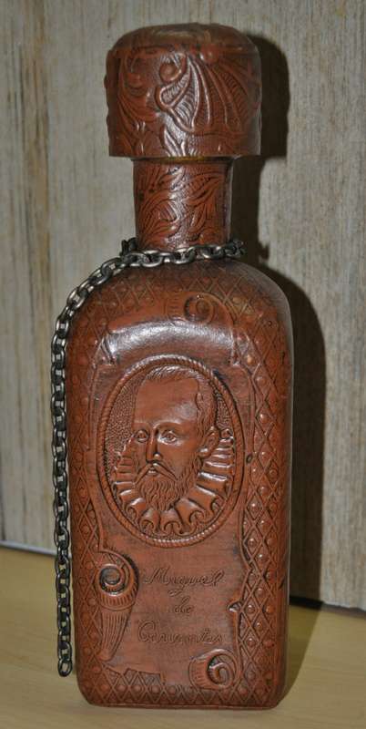 Vintage Miguel de Cervantes embossed Leather wrapped liquor bottle/decanter. Hand-made in Spain
