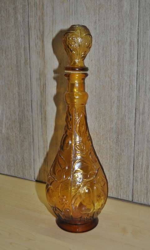 Vintage mid-century embossed amber glass decanter with four glasses
