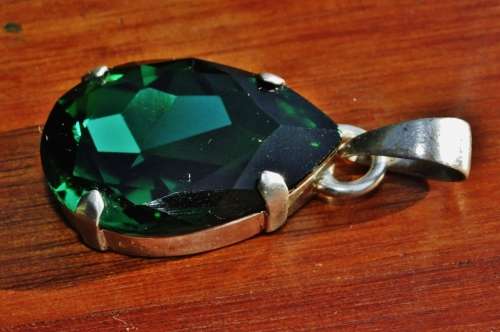 Vintage Bohemian Claw set Faceted Glass Crystal Emerald Teardrop Pendant in silver plated mount