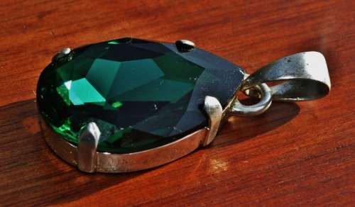 Vintage Bohemian Claw set Faceted Glass Crystal Emerald Teardrop Pendant in silver plated mount