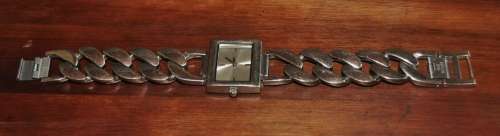 Sturdy stainless steel with linked chain strap, unbranded ladies watch