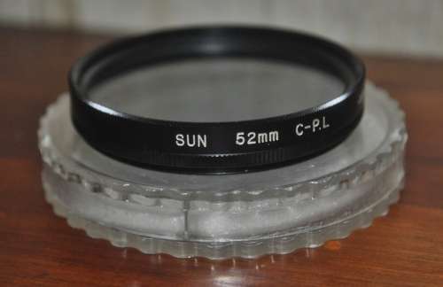 Vintage Sun 52mm C.P.L. Polarising Filter in protective case. Made in Japan