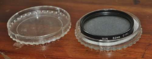 Vintage Sun 52mm C.P.L. Polarising Filter in protective case. Made in Japan
