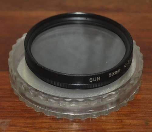 Vintage Sun 52mm C.P.L. Polarising Filter in protective case. Made in Japan