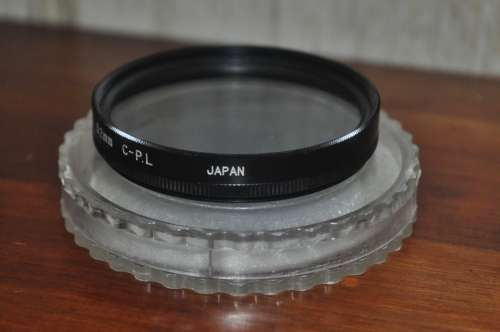 Vintage Sun 52mm C.P.L. Polarising Filter in protective case. Made in Japan