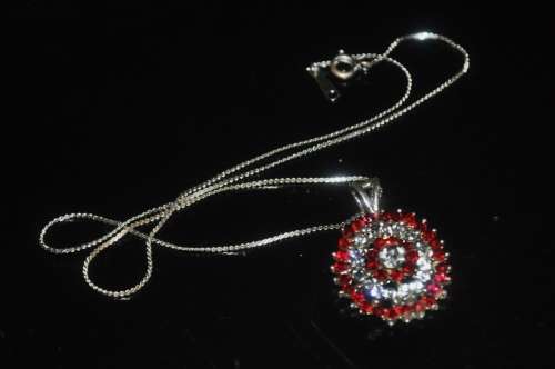 Vintage Silver Tone Ruby and Clear Rhinestone Oval Pendant Necklace
