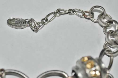 Vintage Chunky Silver Tone, Topaz Coloured Faceted Crystal, and Quartz Charm Bracelet signed D+H