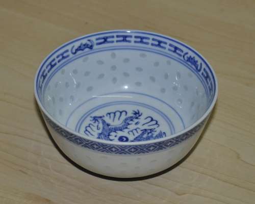 Vintage Chinese Porcelain Translucent Rice Grain Blue and White Dragon Bowl