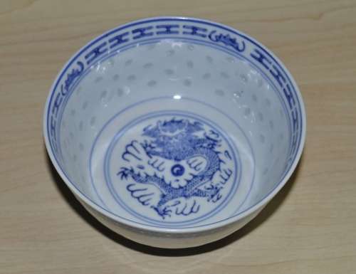 Vintage Chinese Porcelain Translucent Rice Grain Blue and White Dragon Bowl