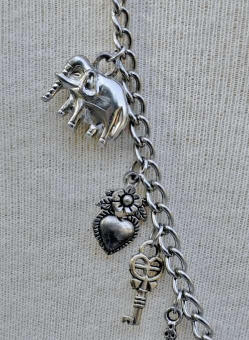 Vintage Silver Tone Charm Necklace with Red Bead and Woven Sphere Pendant