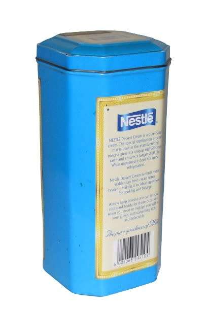 Vintage, collectible Nestlé Dessert Cream Tin with French Advertising `Lai Suisse La Laitiere`