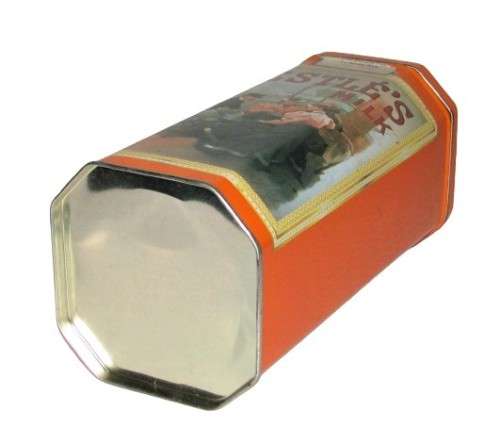 Vintage, collectible Nestlé Treat Tin decorated with vintage advertising
