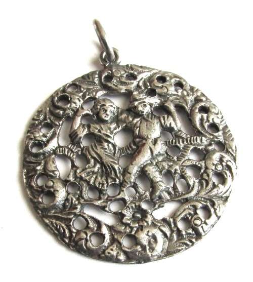 Antique late 19th Century Victorian Silver plated large round repoussé pendant
