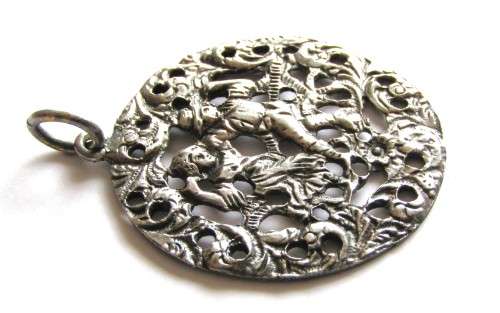 Antique late 19th Century Victorian Silver plated large round repoussé pendant