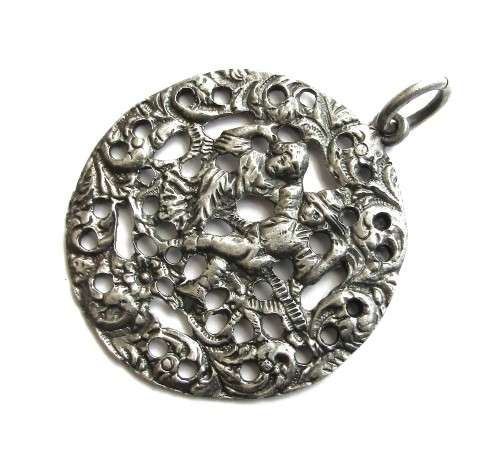 Antique late 19th Century Victorian Silver plated large round repoussé pendant
