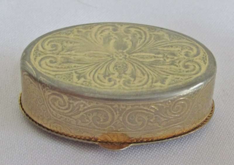 Vintage gold tone Rococo style pill box with Fragonard Courting Couple Decoration