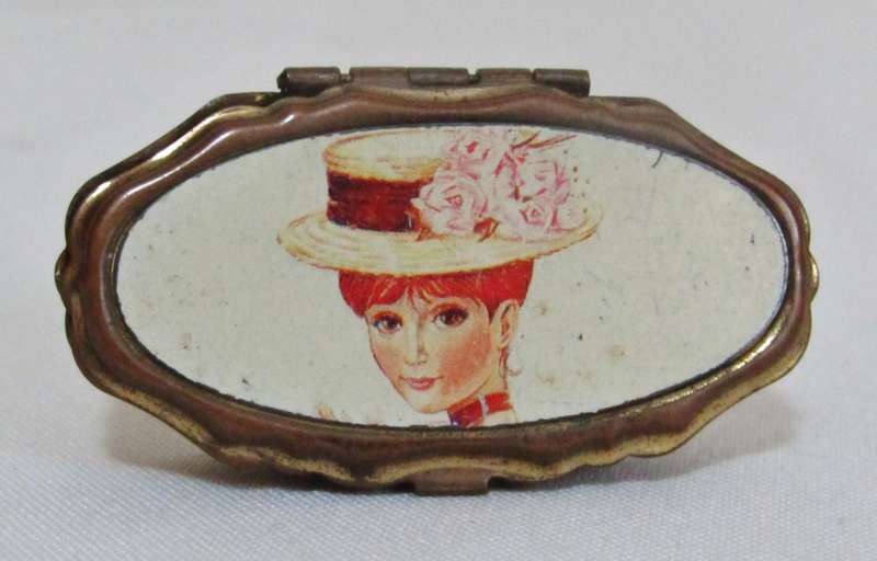 Vintage gilt copper lined pillbox with portrait decoration of young lady