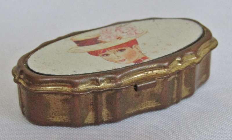 Vintage gilt copper lined pillbox with portrait decoration of young lady