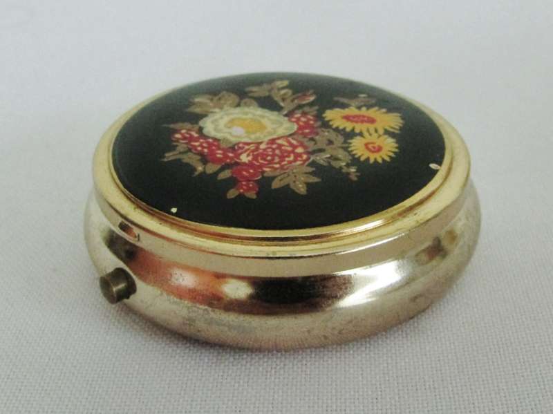 Vintage round gilt metal pill box with bouquet decoration - Made in Japan