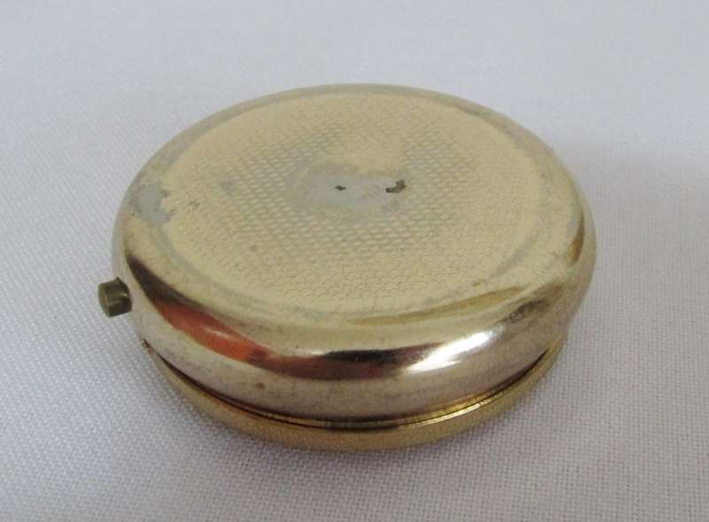 Vintage round gilt metal pill box with bouquet decoration - Made in Japan