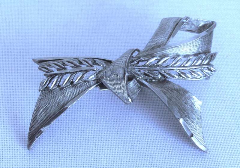 Vintage silver tone bow brooch pin