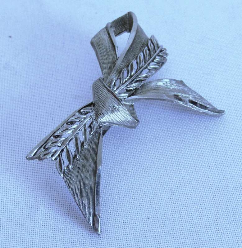 Vintage silver tone bow brooch pin