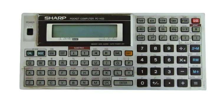Sharp PC-1403 Pocket Computer in working condition with case