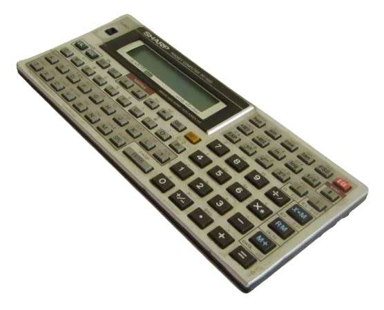Sharp PC-1403 Pocket Computer in working condition with case