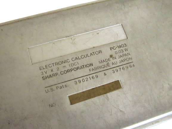 Sharp PC-1403 Pocket Computer in working condition with case