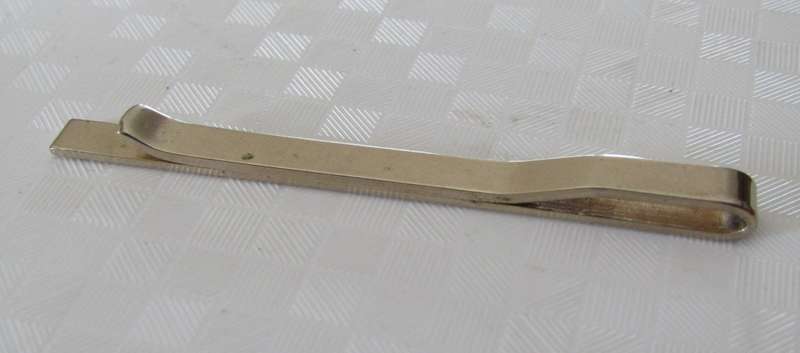 Vintage gold tone tie bar with engraved design