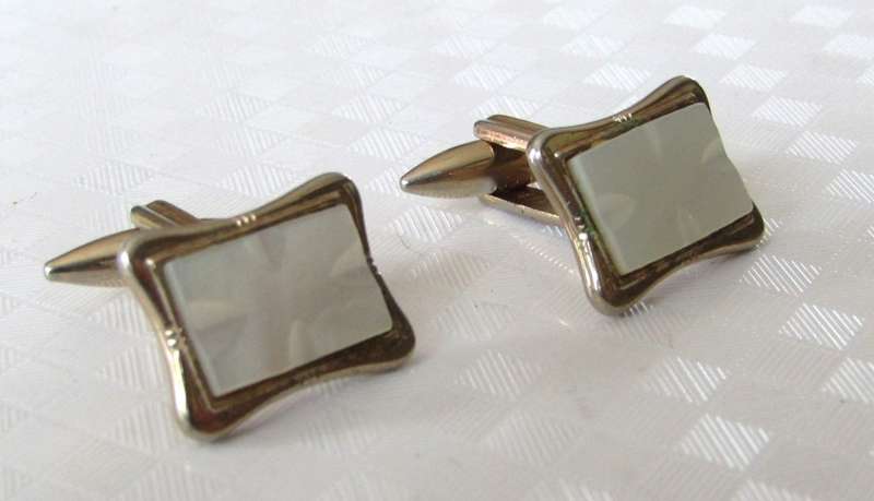 Vintage gilt cufflinks with mother of pearl decoration signed Gilda Stratton