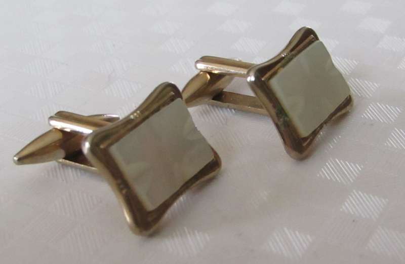 Vintage gilt cufflinks with mother of pearl decoration signed Gilda Stratton