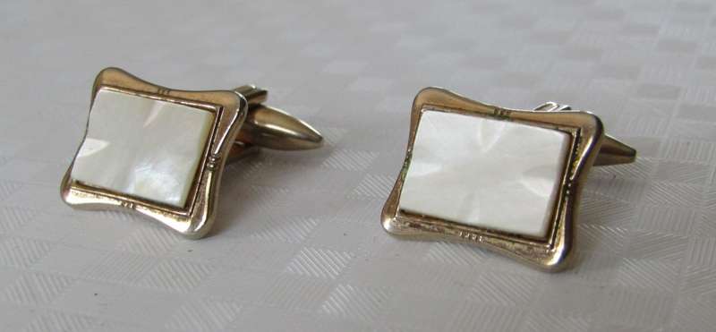 Vintage gilt cufflinks with mother of pearl decoration signed Gilda Stratton